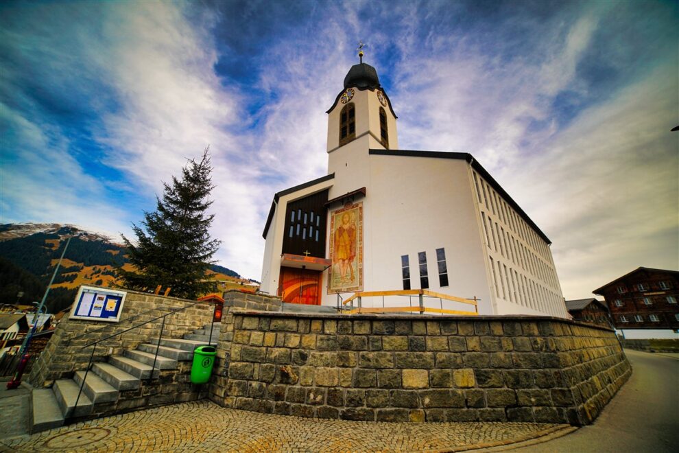 the majestic peaks of the Alps, the serene lakes reflecting the azure sky, and the charming villages nestled amidst lush greenery