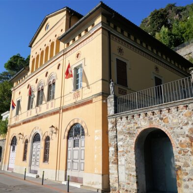 Aerial view of Lugano with its sparkling lake and the surrounding lush mountains