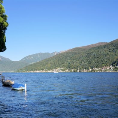 Aerial view of Lugano with its sparkling lake and the surrounding lush mountains