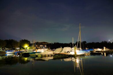 Alpine meadows dotted with wildflowers, nestled between rugged mountain peaks near Furka